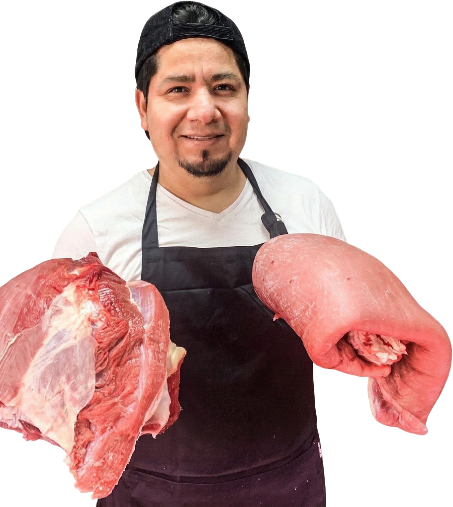 Carles con dos cortes de carne fresca en la carnicería